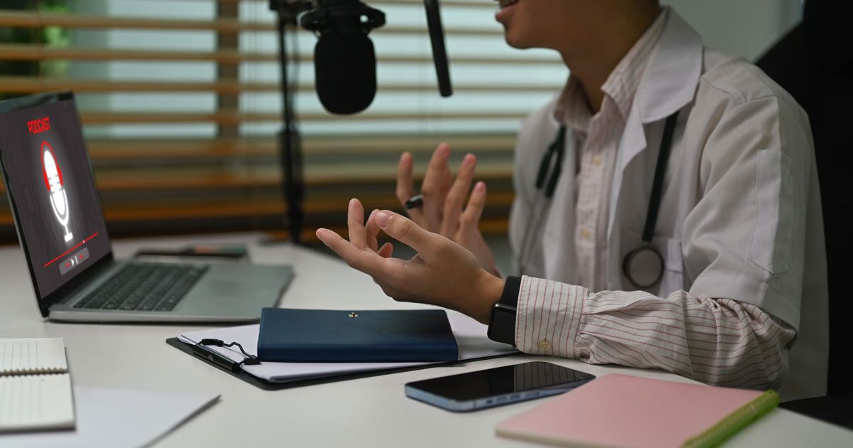 A doctor is sitting at a desk with a laptop and a microphone Podcasts Dr John Salerno of Salerno Wellness Official Podcast Archive for Dr. John P. Salerno