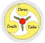 Emblem with yellow curves and circles, red center, text: