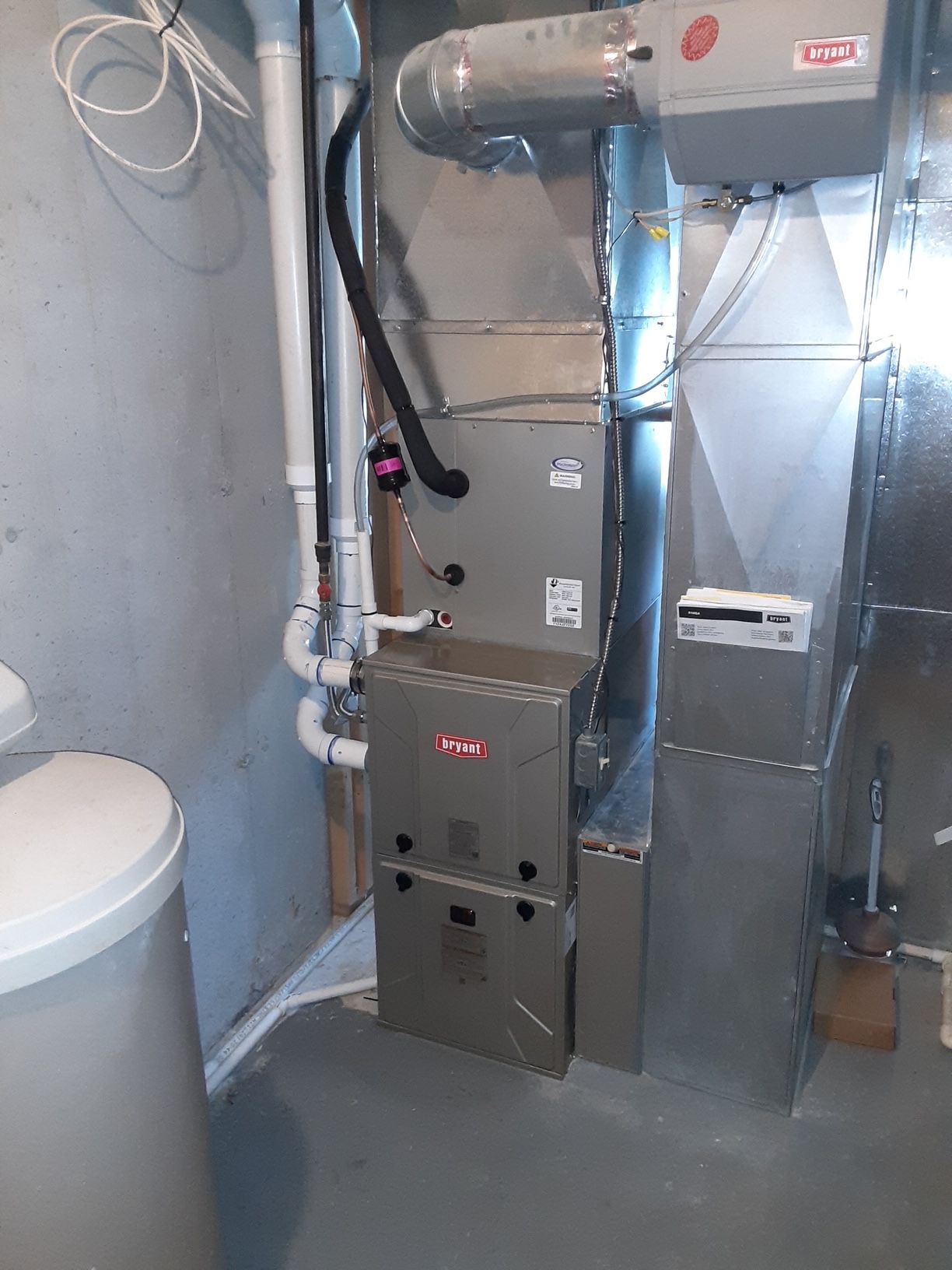 There is a furnace in the basement of a house.