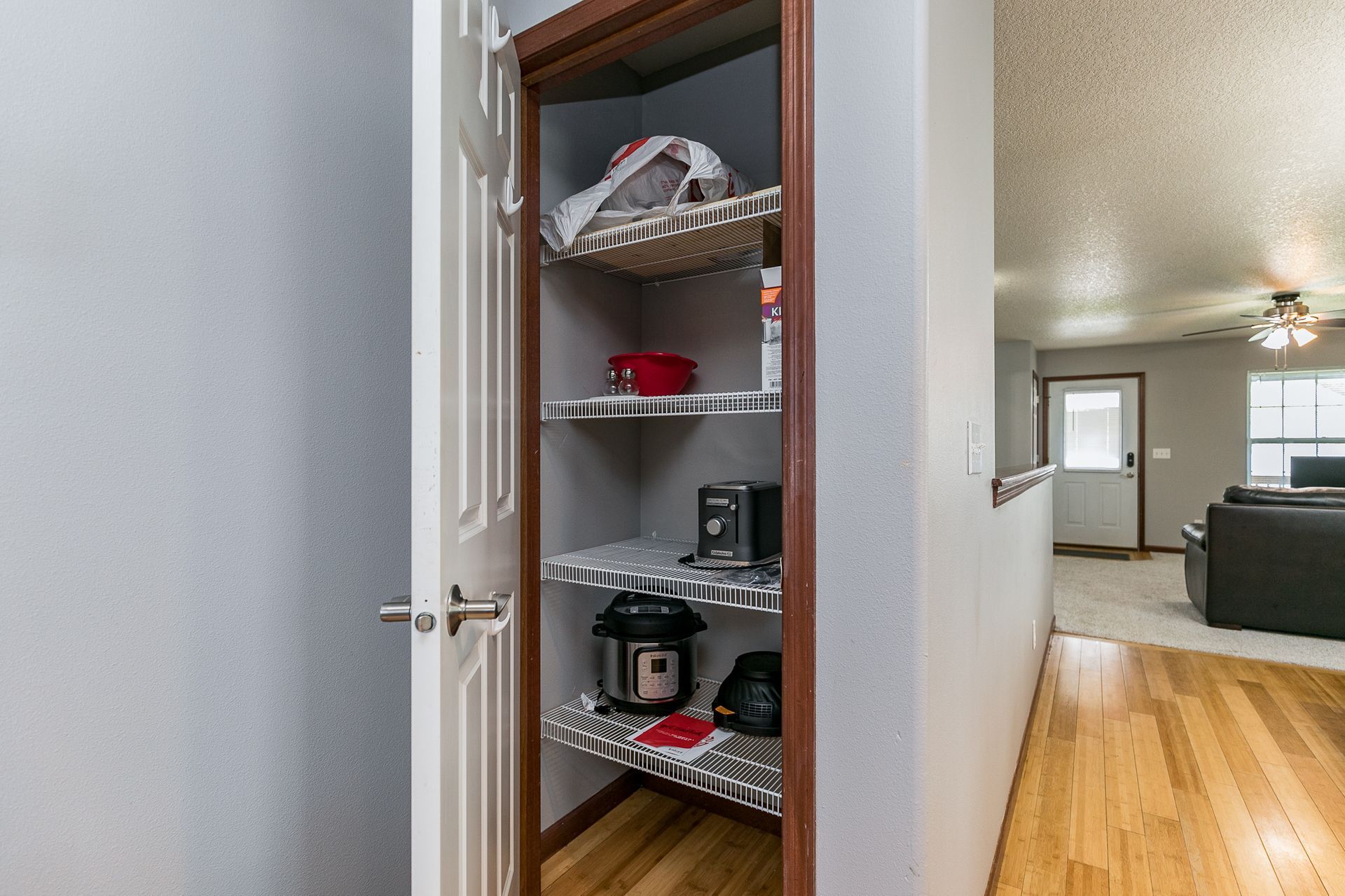 The Stadium House  living room storage