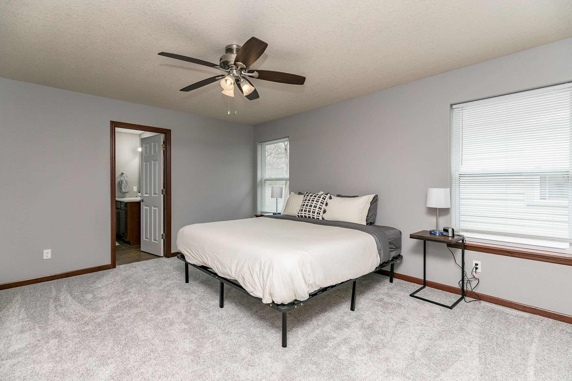 The Stadium House bedroom with fan