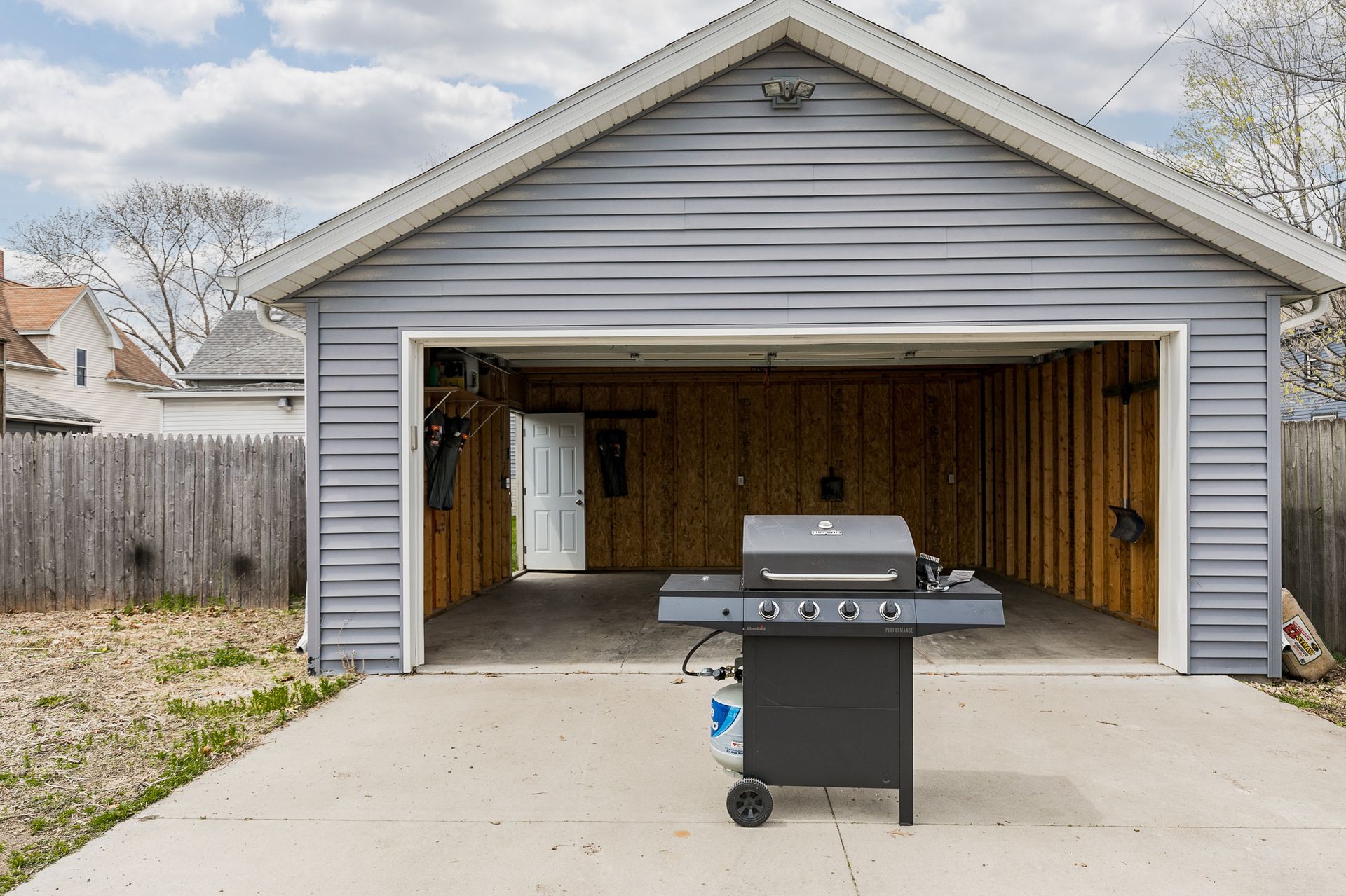 The Stadium House garage with grill