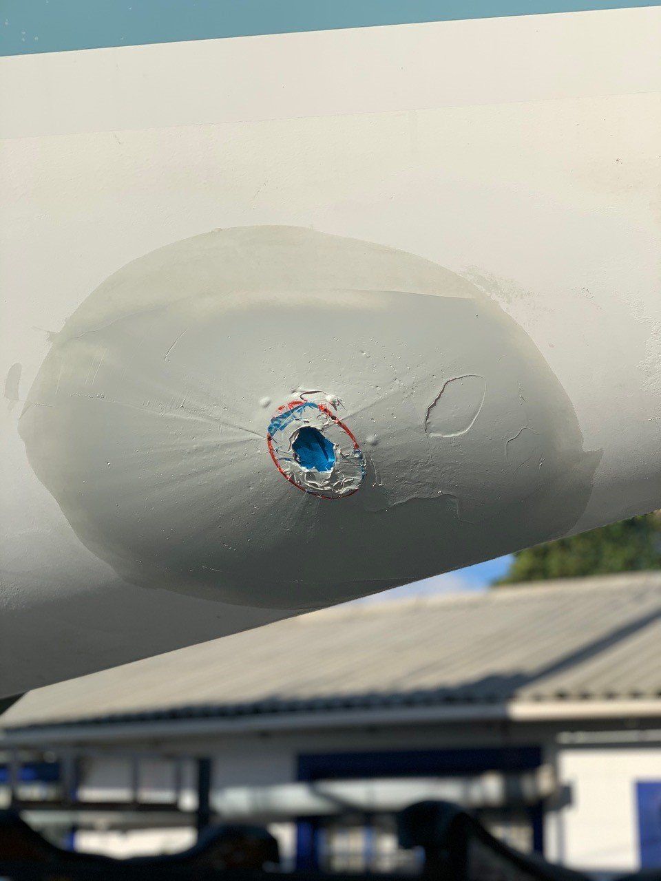 A Epoxy resin is curing after it has been applied to a Jet Thruster Nozzle flange on a sailing yacht