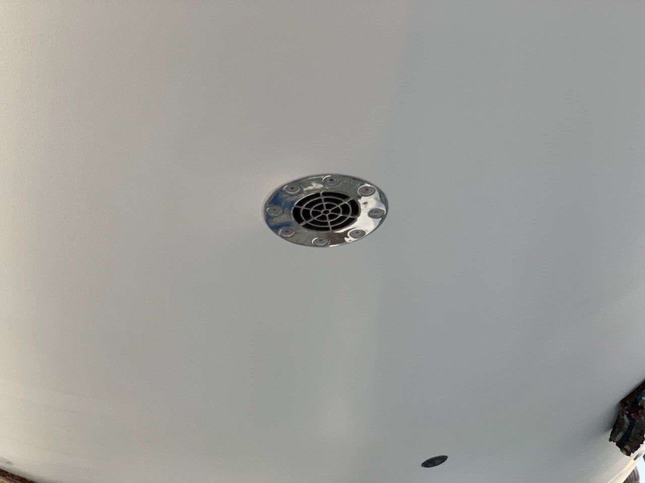 A Jet Thruster water inlet filter is visible on the bottom of a sailingyacht