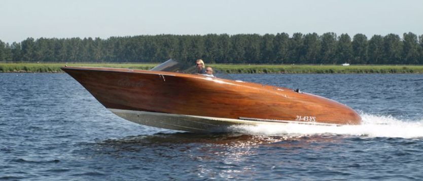 The very small Jet Thruster nozzle opening visible in the bow of a motor boat