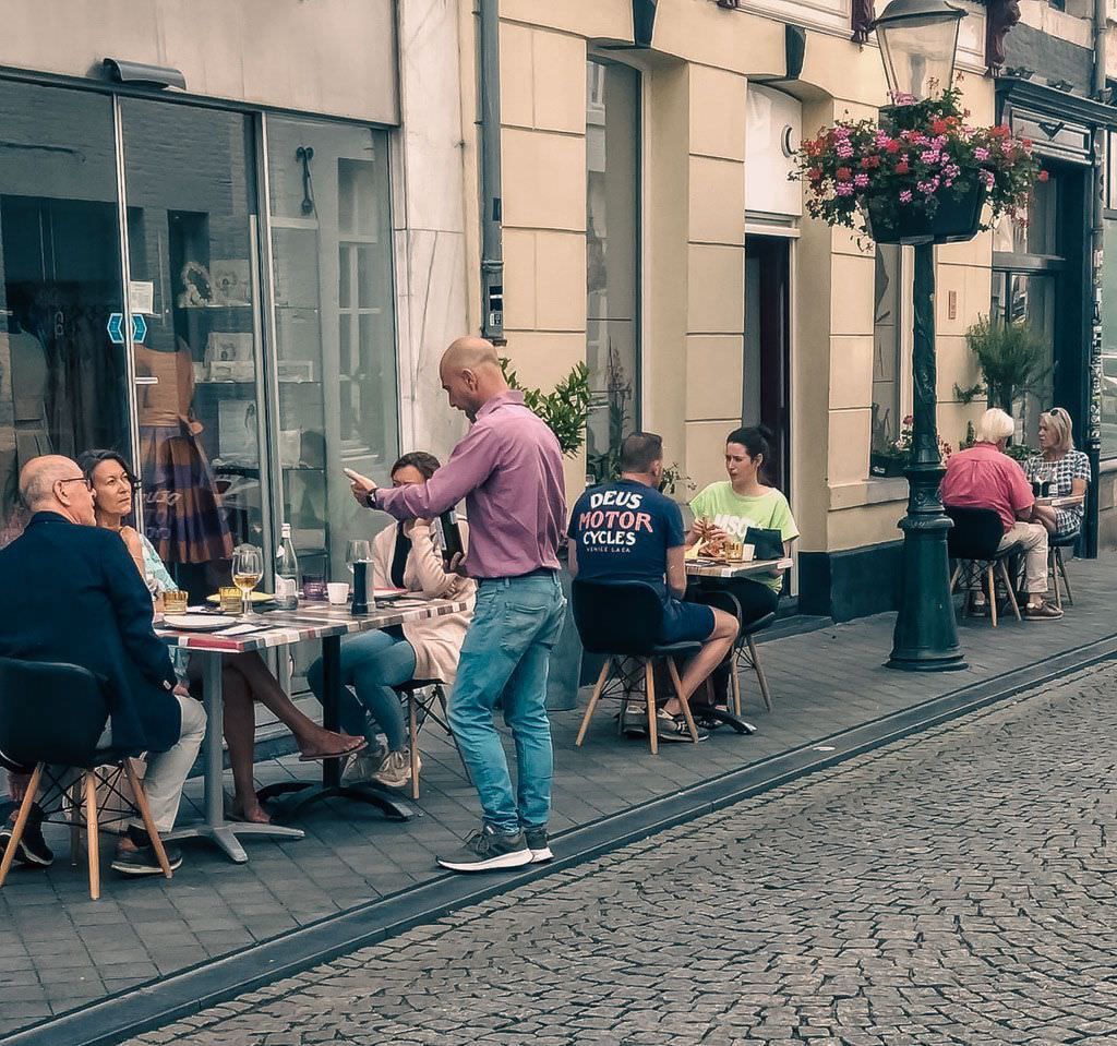 People drinking a glass of wine