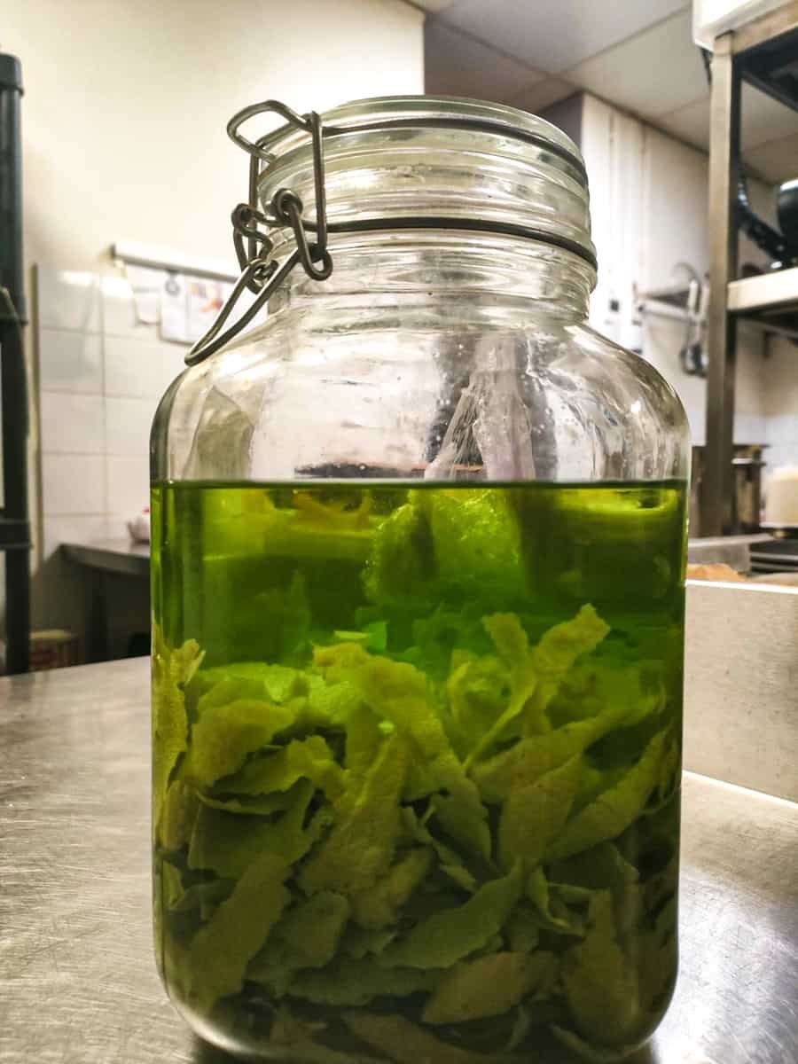 Homemade herbal liqueur jar