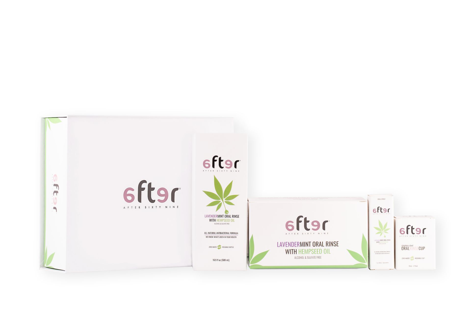 A white box with a green leaf on it is sitting next to a smaller box.