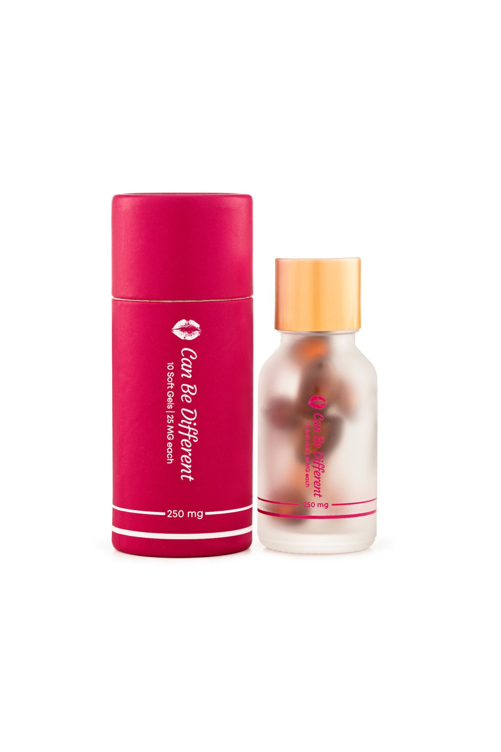 A bottle of perfume is sitting next to a pink tube.