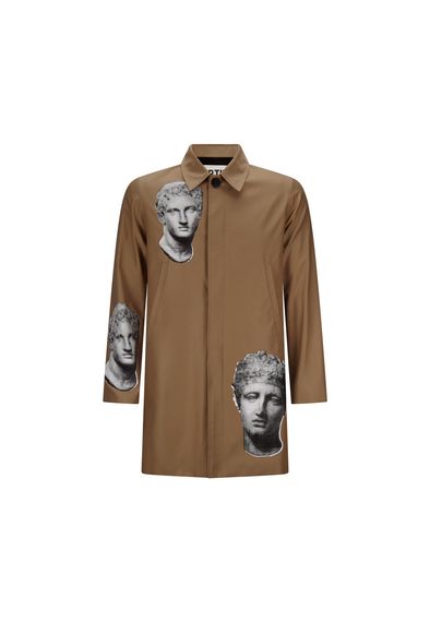 A brown trench coat with three heads on the sleeves.