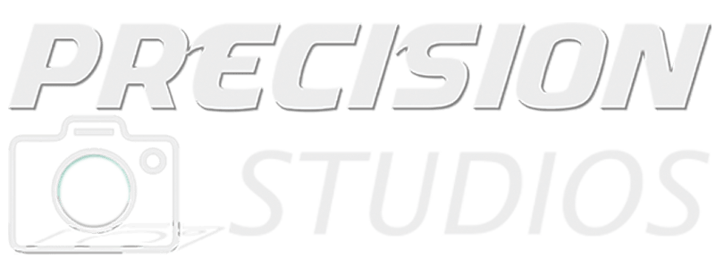 A white logo for precision studios with a picture of a camera.