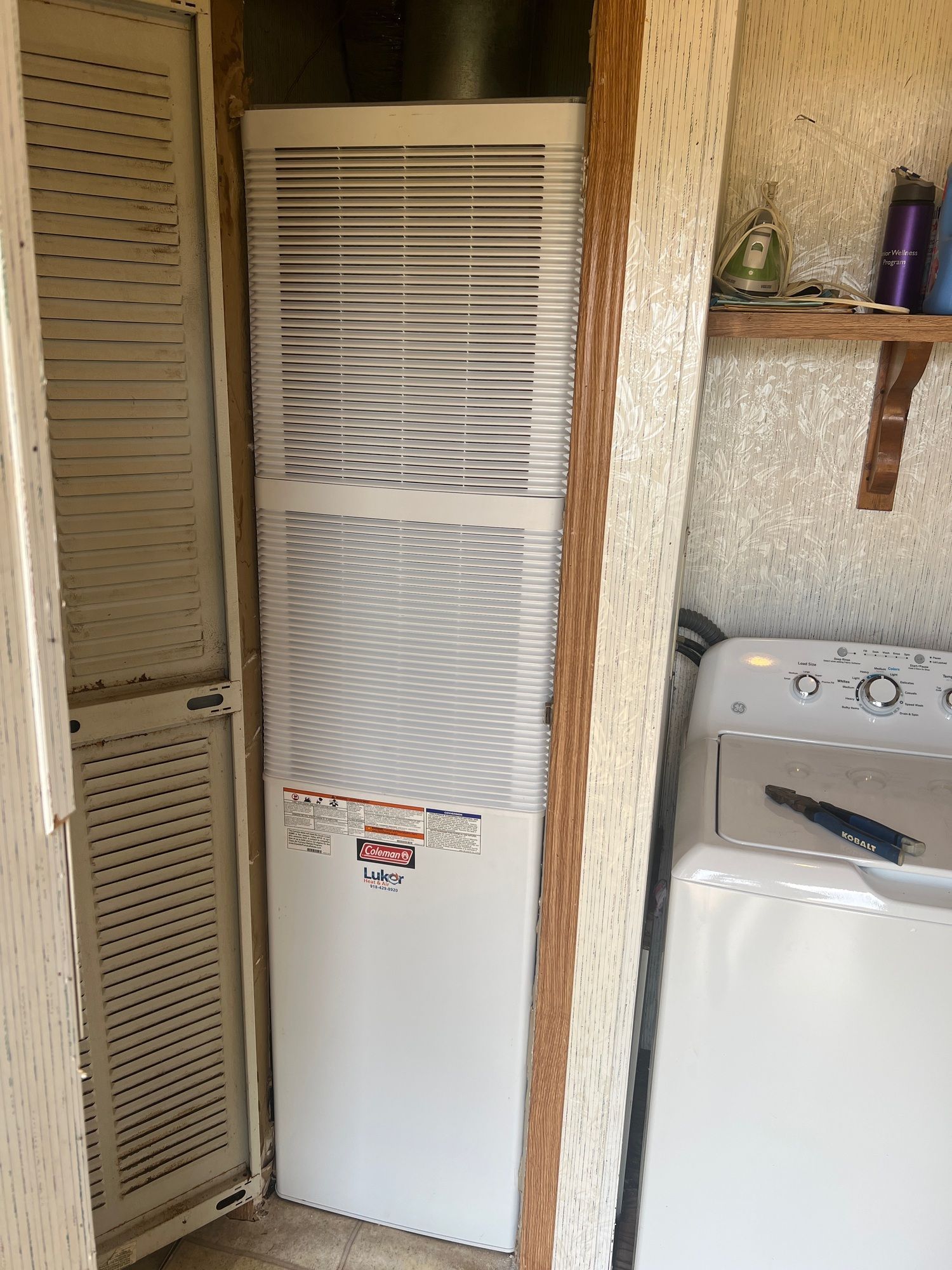 There is a washer and dryer in the laundry room.