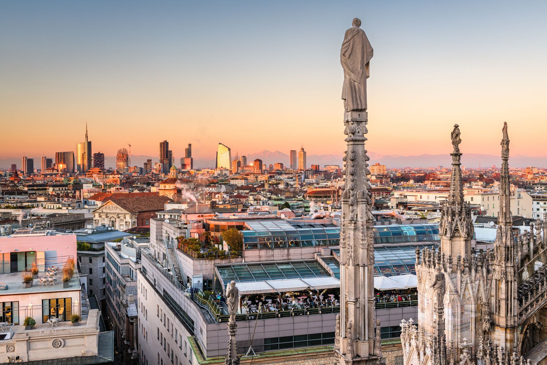 Sunset view of Barcelona skyline with the Sagrada Família and city rooftops