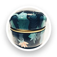 Round tin container with tropical leaf print in blue, green, and pink, gold band around the middle.