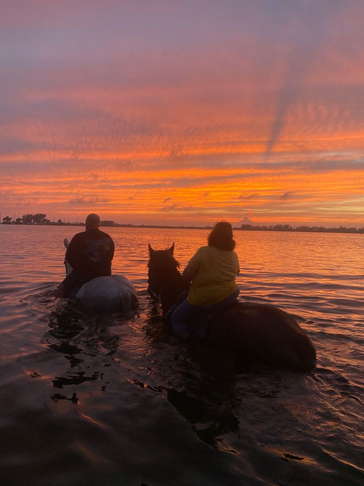 Group of girls horse back riding