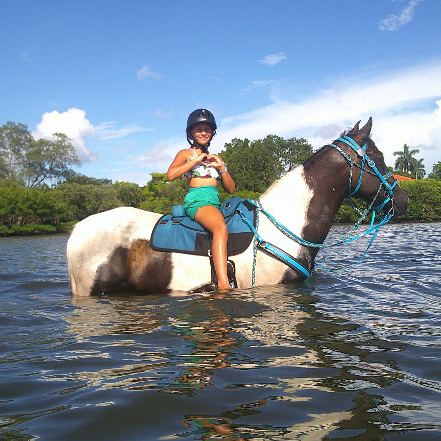 Woman horseback riding heart