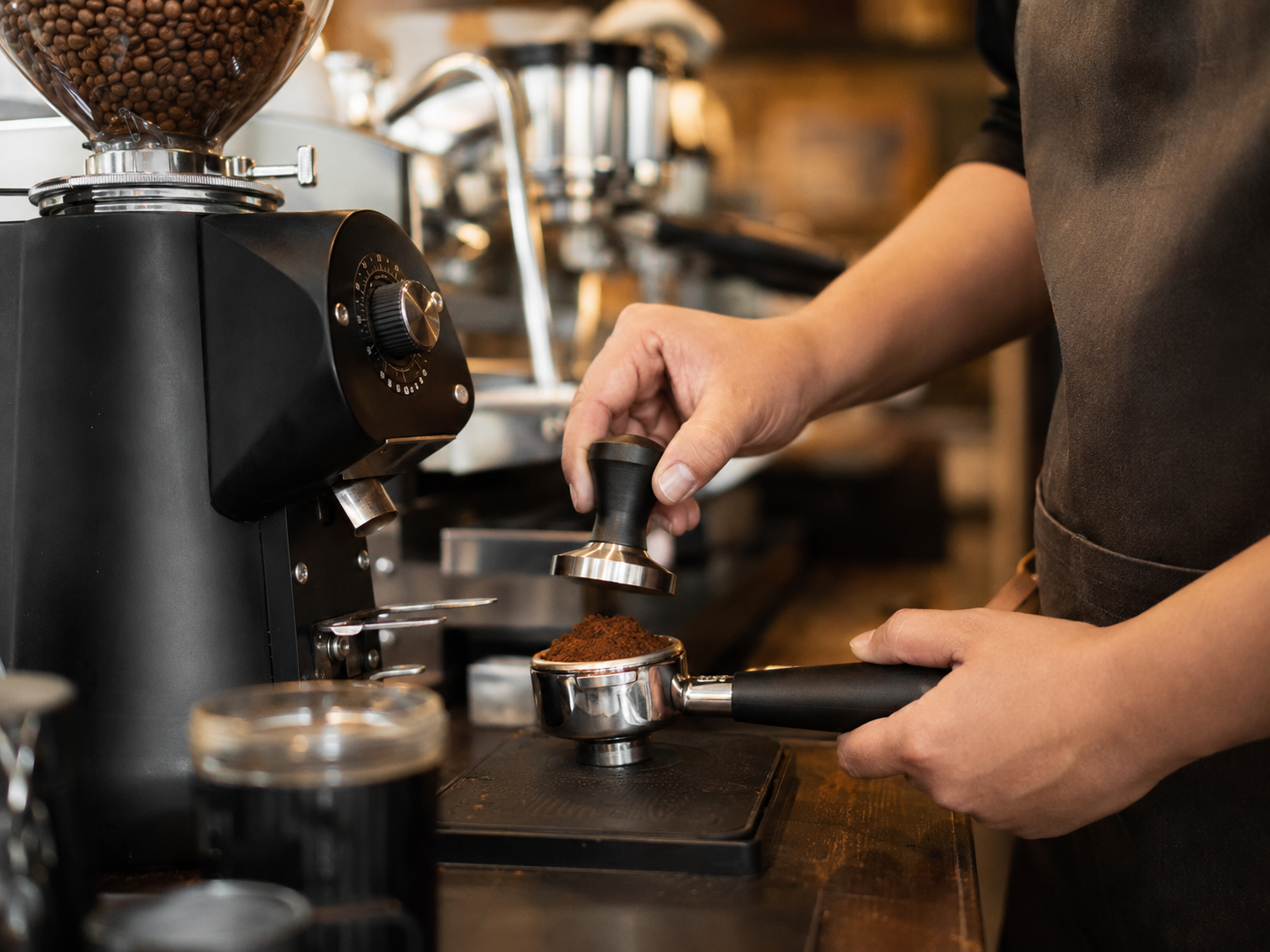 barista preparing espresso at artisan coffee shops