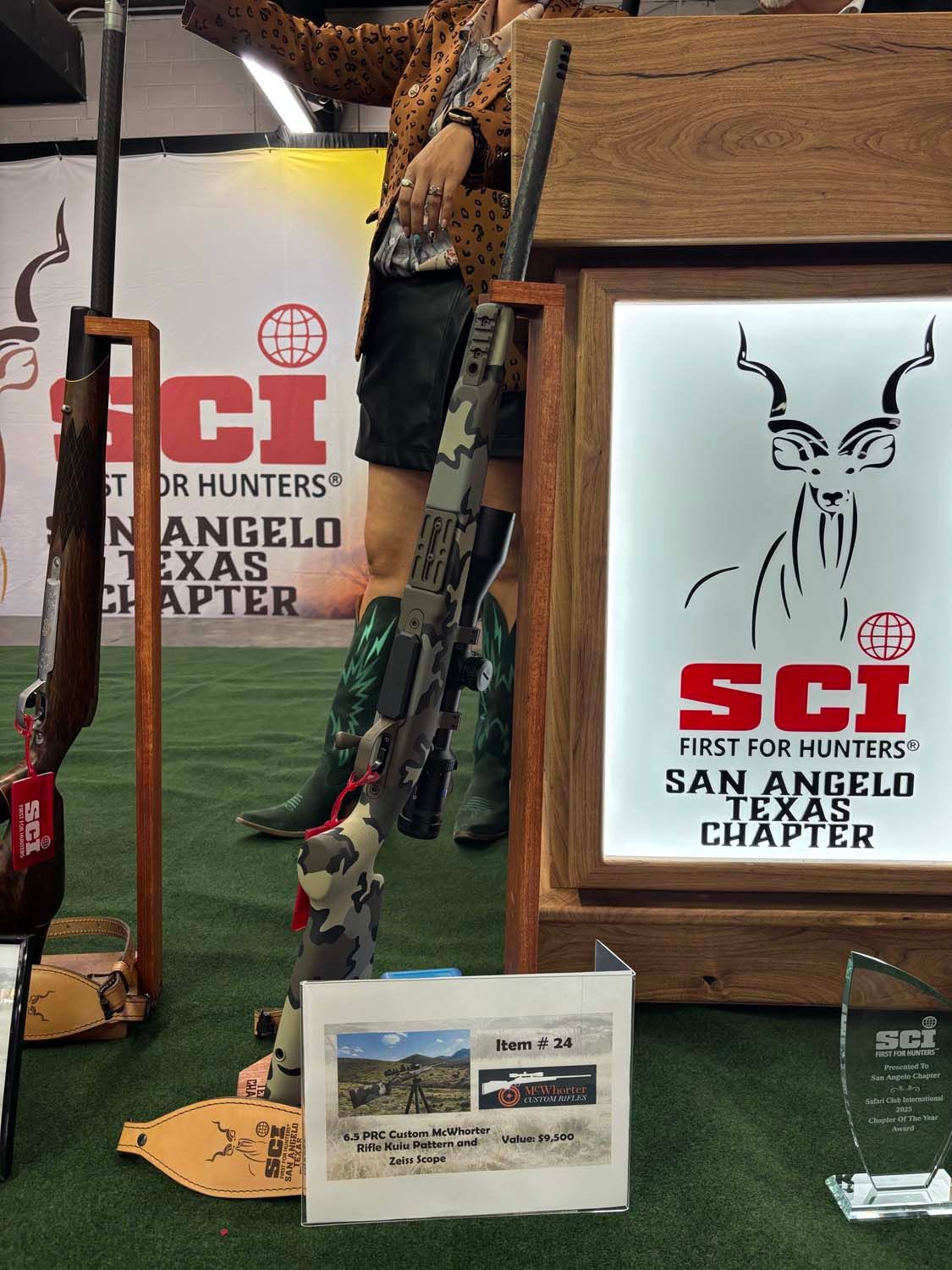 SCI San Angelo Texas chapter booth with deer display and signs at an indoor event