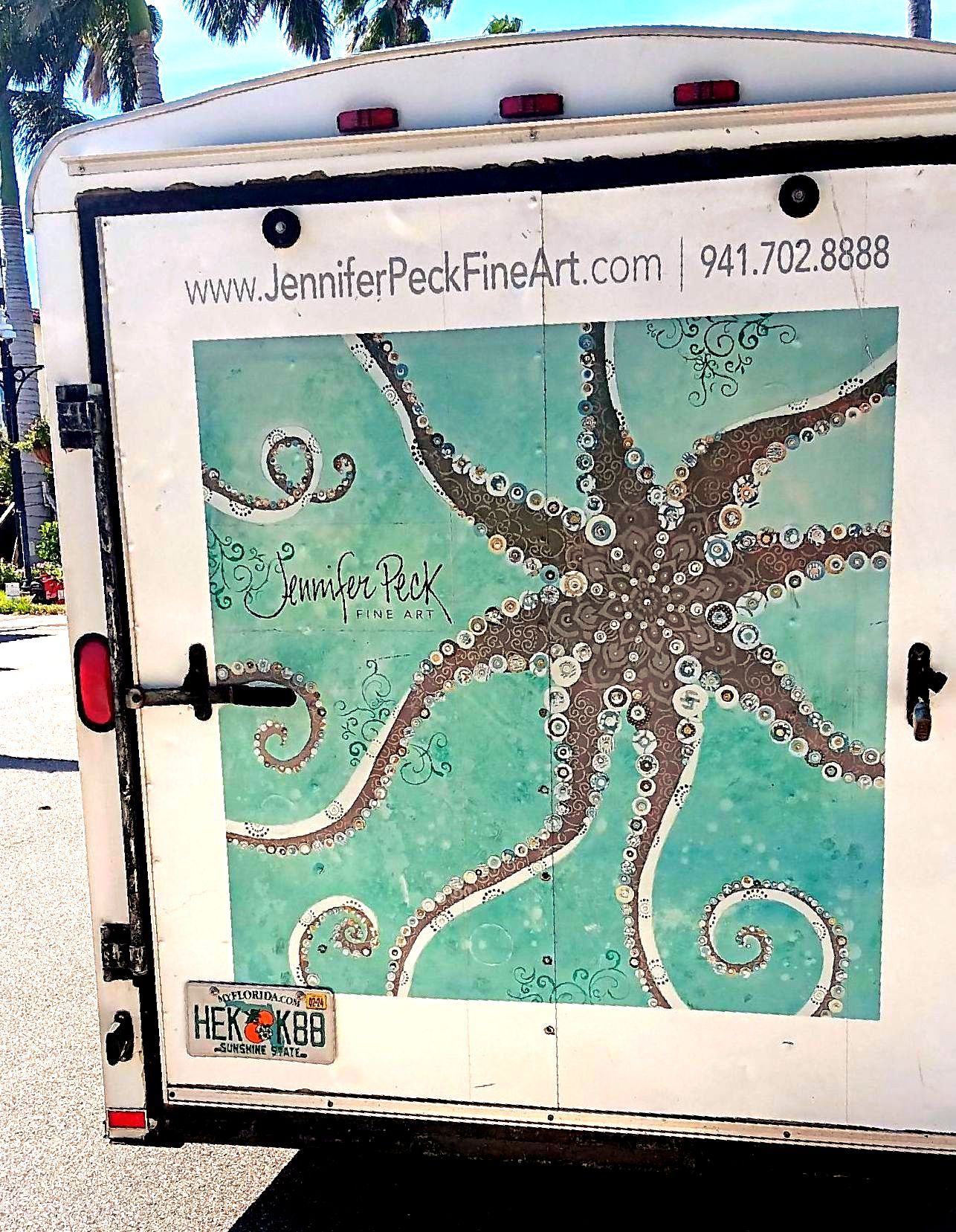 A trailer with a painting of an octopus on it