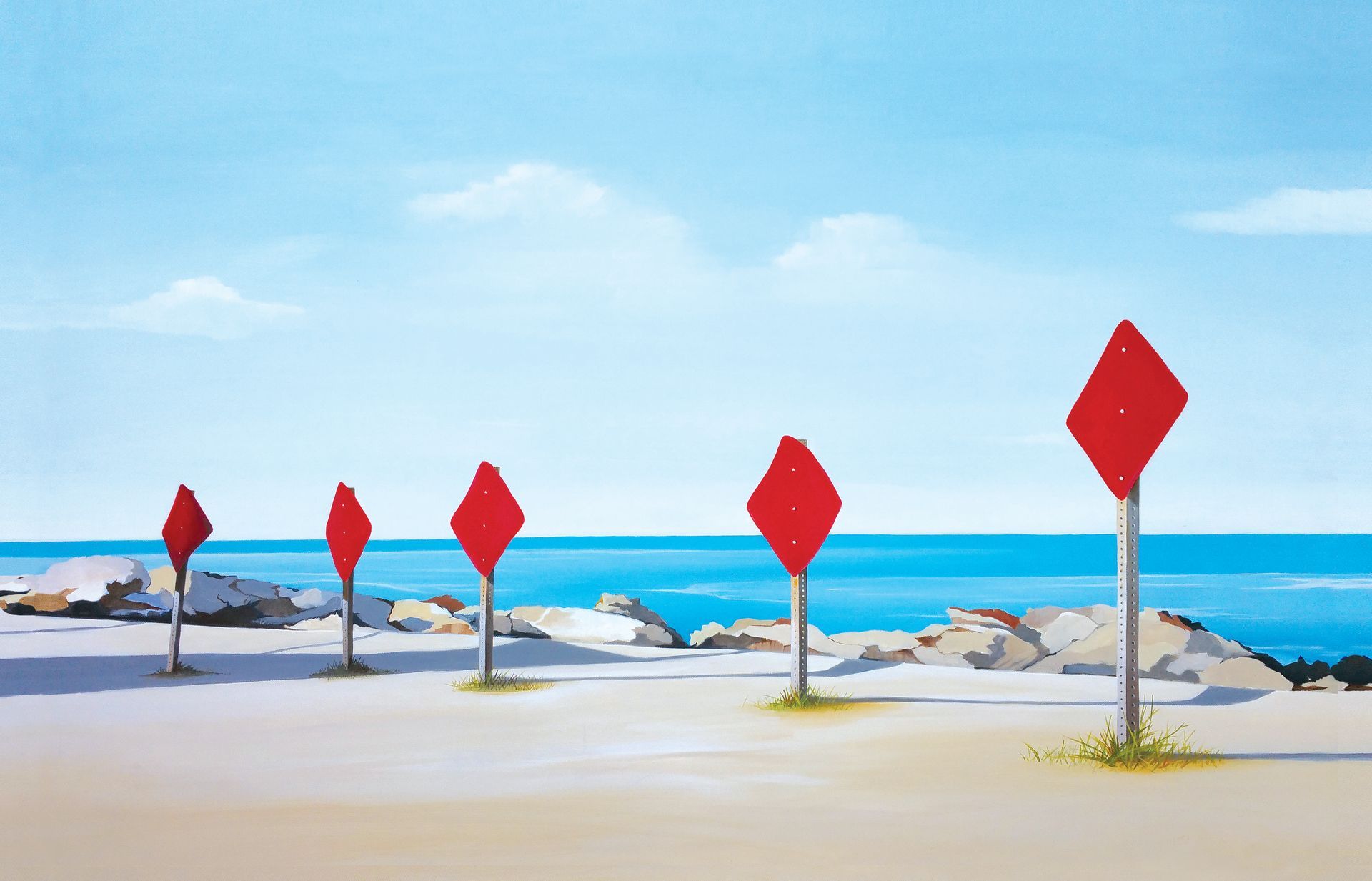 Five empty red diamond-shaped signs stand in a row along a sandy beach overlooking the blue sea.