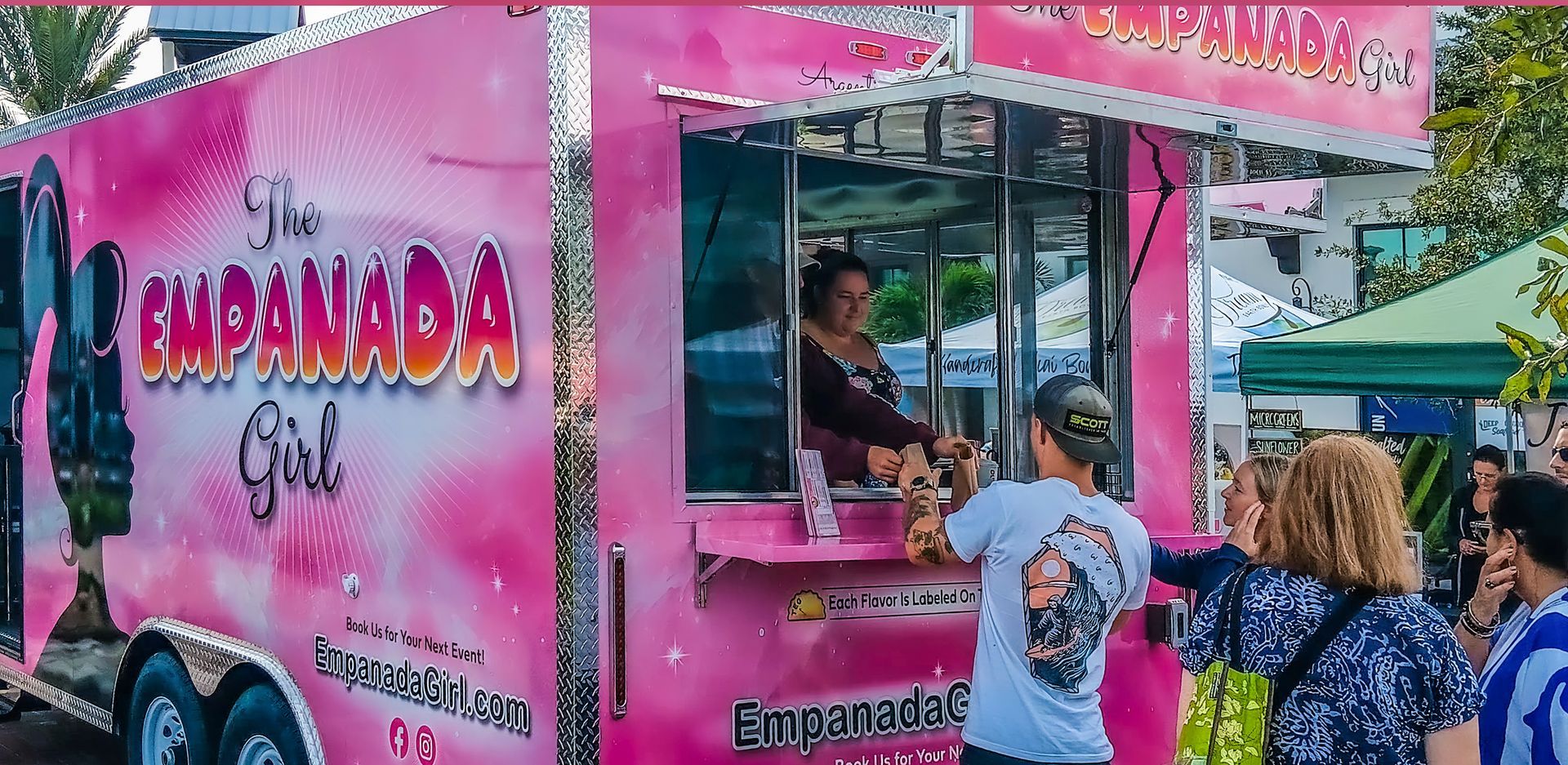 A pink food truck called the empanada girl