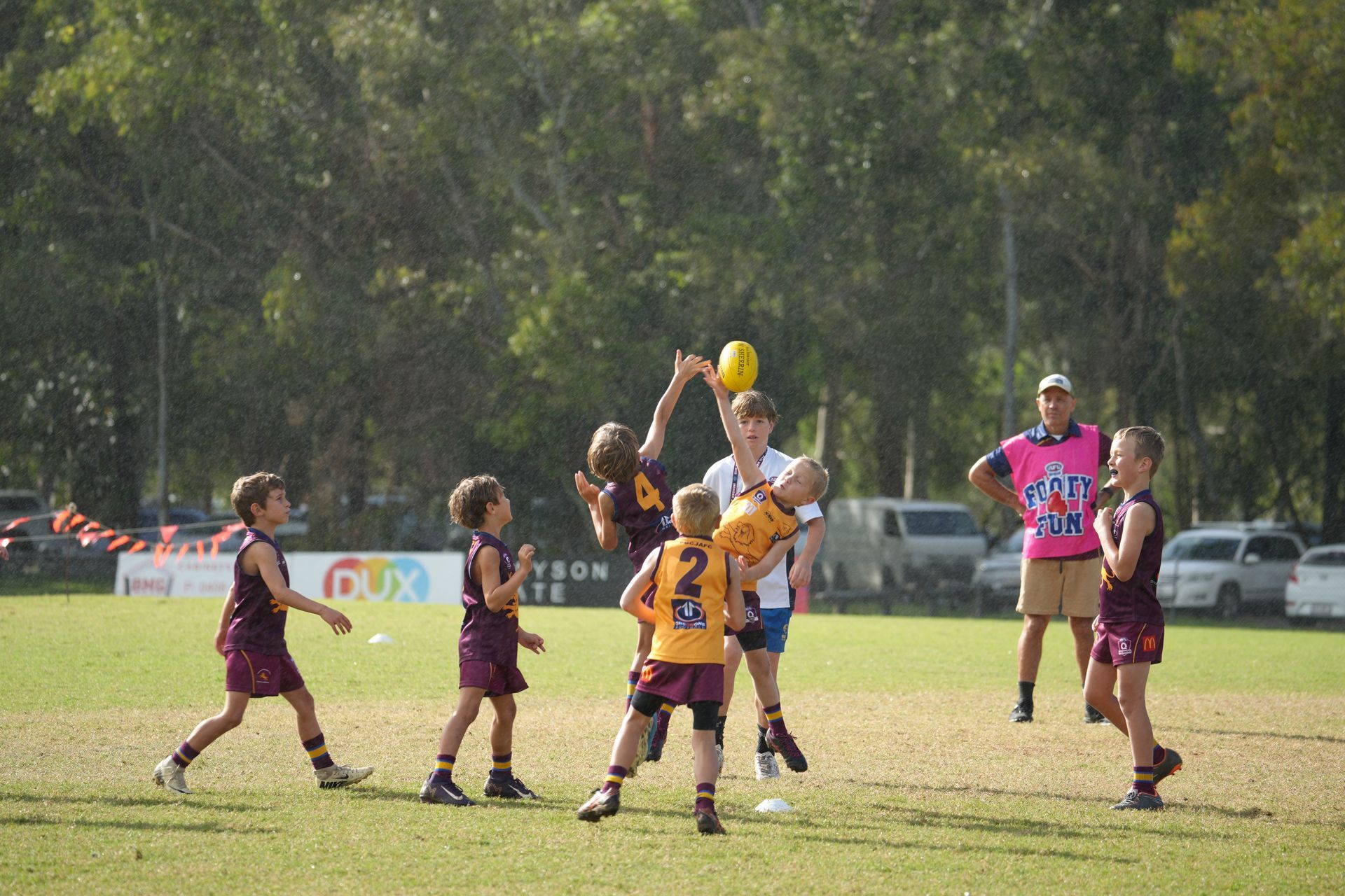 AFL Auskick logo in blue and red with a red football arc