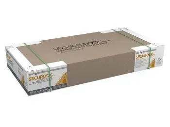 A box of roofing boards is sitting on top of a table.