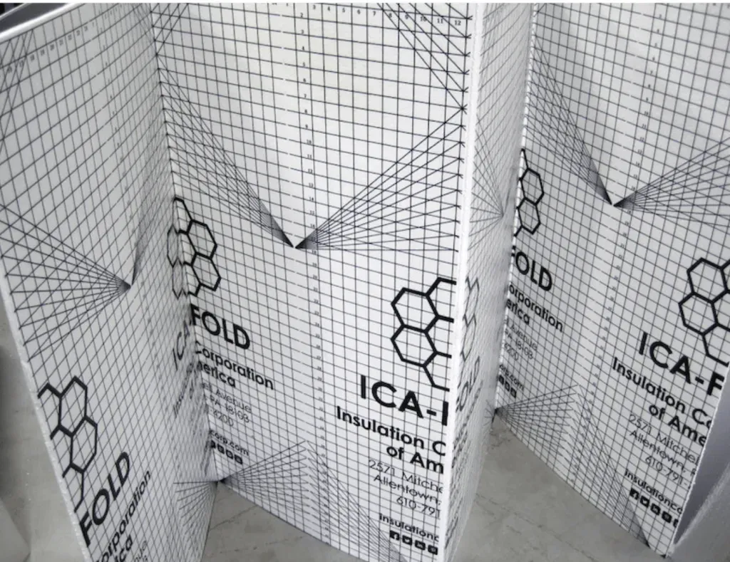 A close up of a piece of paper with a grid pattern on it.