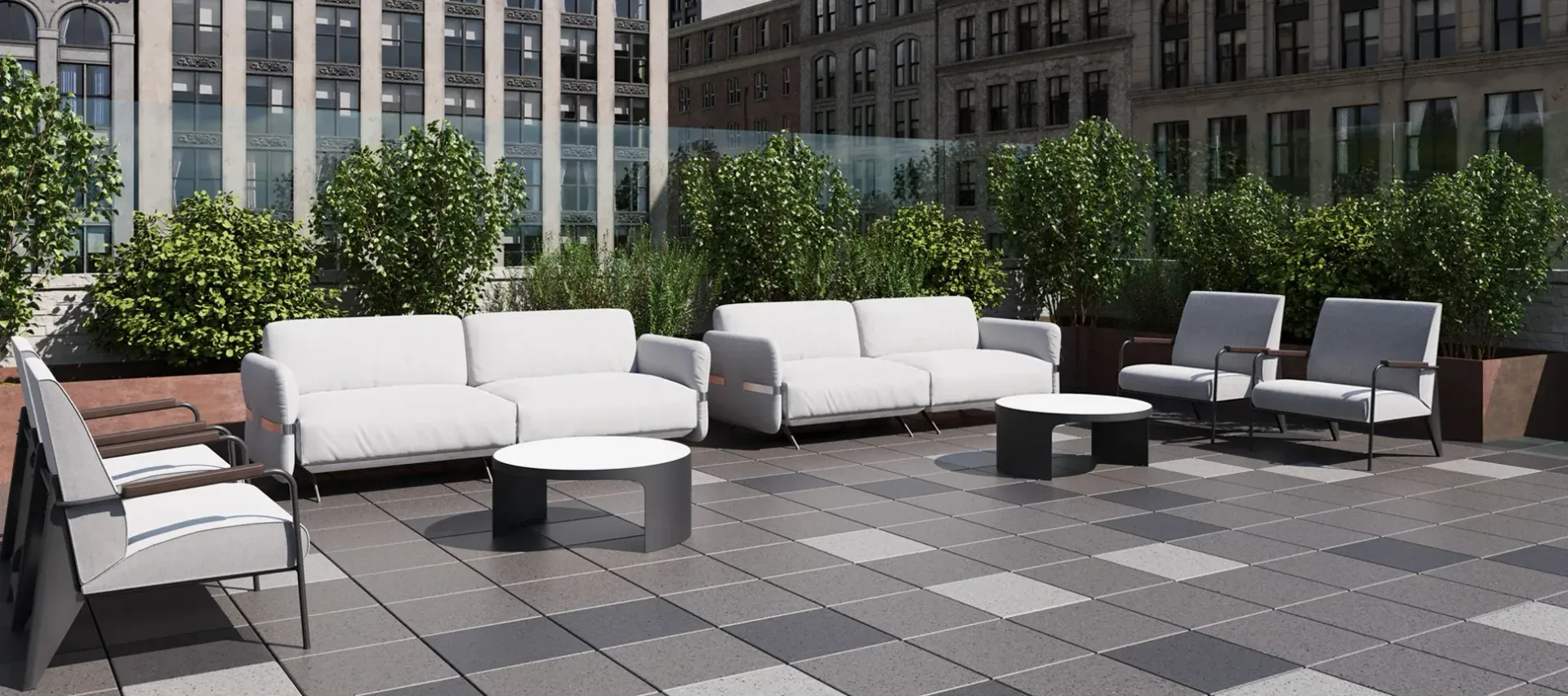 A patio with a couch , chairs , tables and potted plants.