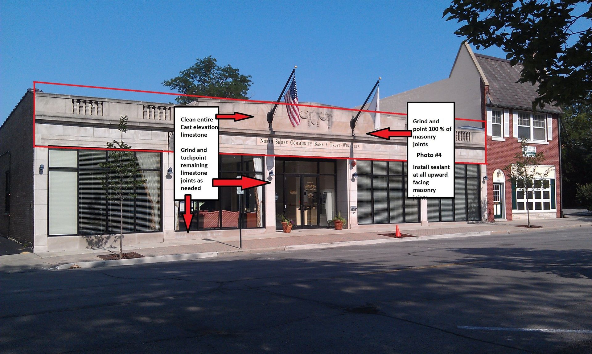 A commercial building exterior marked with red lines and text callouts indicating necessary facade repairs and restoration.