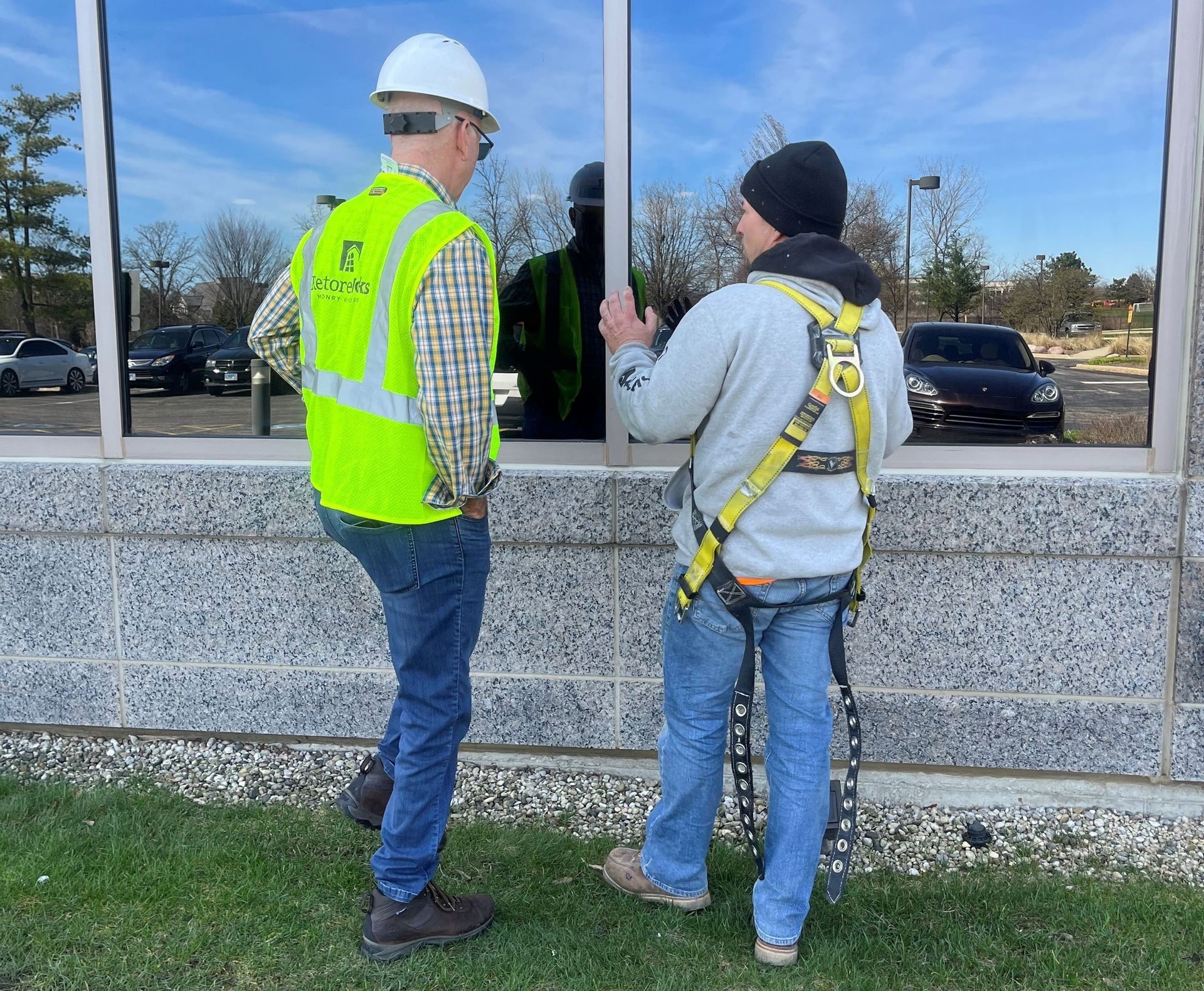 RestoreWorks team conducting a commercial masonry site assessment at the College of American Pathologists in Northfield, Illinois.