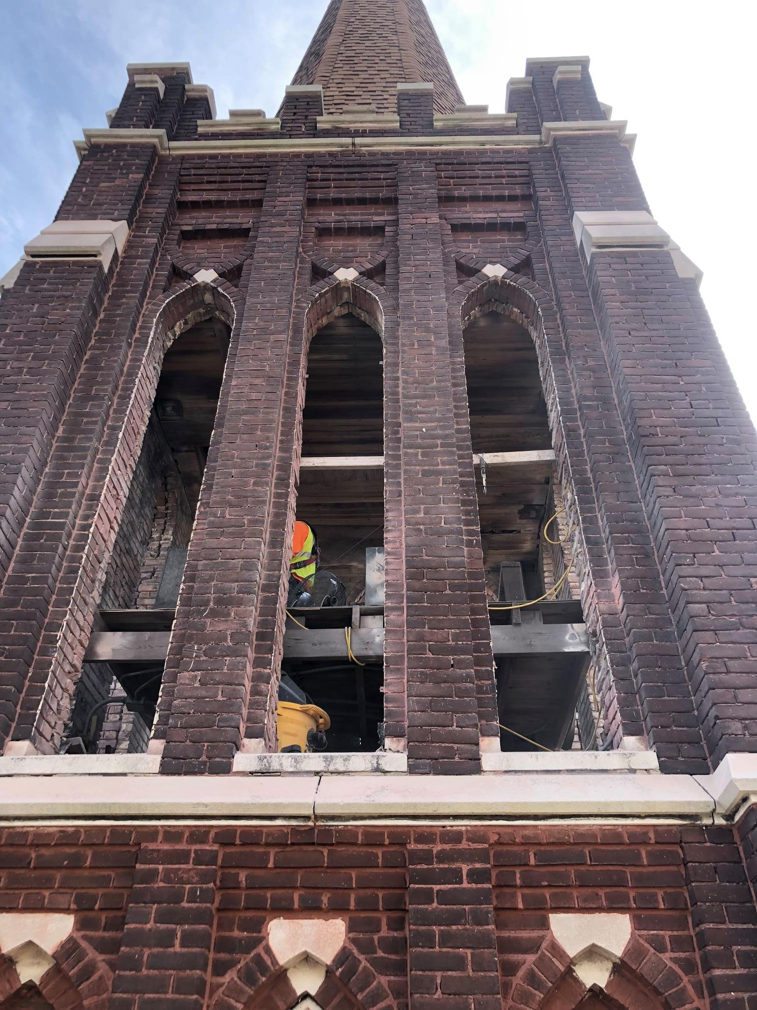 St. Joseph church arches and clock tower under construction.