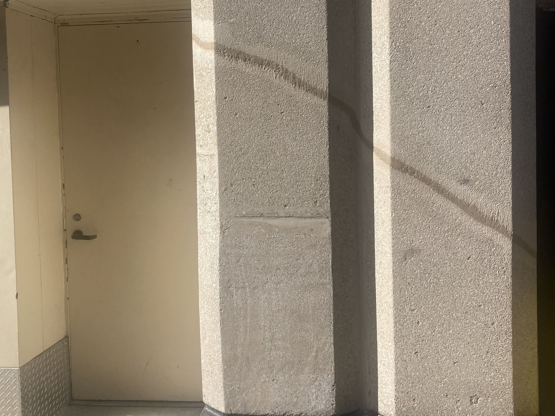 Completed concrete restoration at the Sheraton Grand Chicago Riverwalk showing seamless color and texture match to the existing façade.