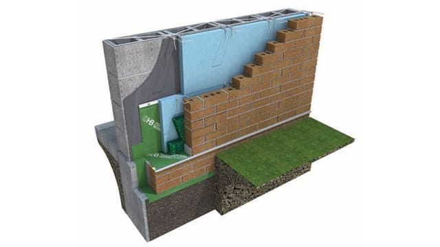 A cross-section diagram showing foundation wall construction layers, including insulation, brick, and concrete blocks.