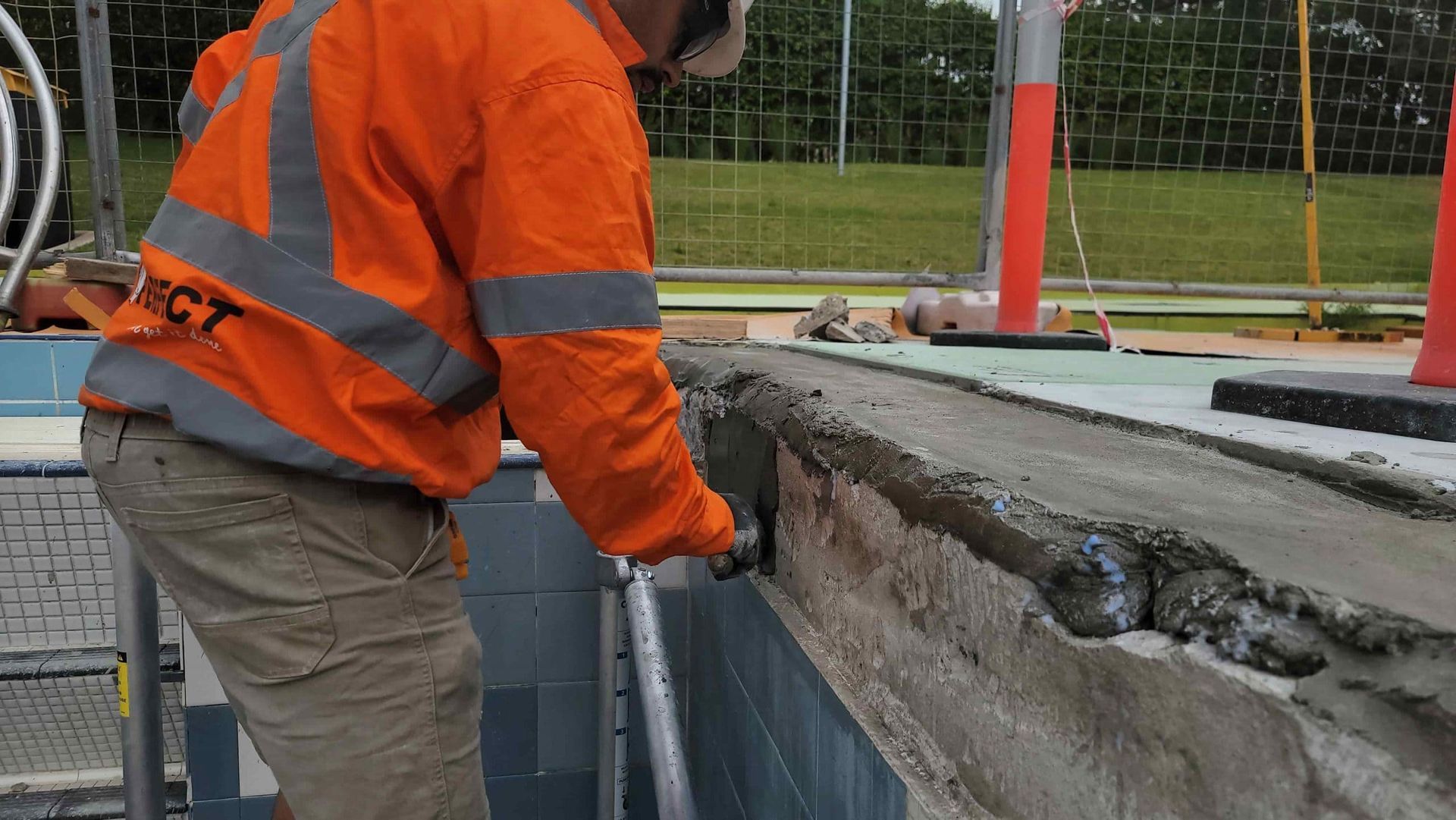 Localized concrete patching repair on a commercial concrete structure