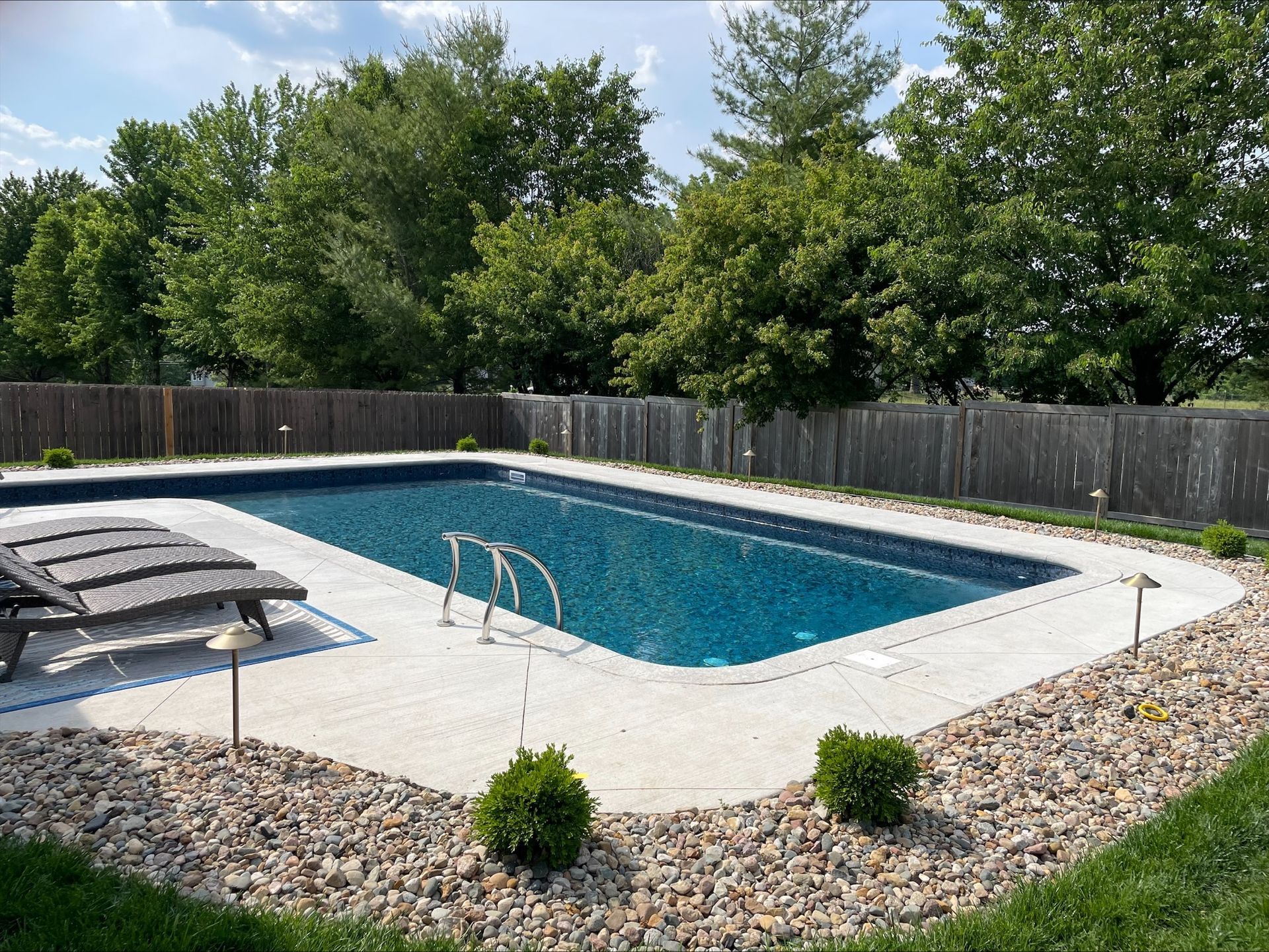 Custom vinyl liner pool with tanning ledge in Lee's Summit MO