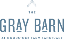 The Gray Barn logo at Woodstock Farm Sanctuary in gray and blue