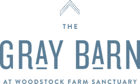 The Gray Barn logo at Woodstock Farm Sanctuary in gray and blue