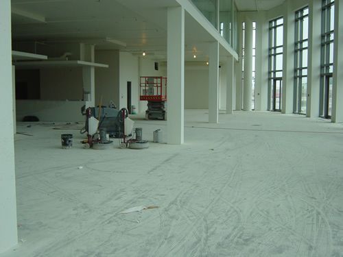A large empty building with a lot of windows