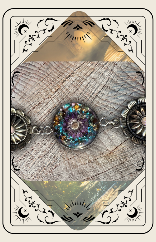 A close-up of a bracelet with a colorful, glittery circular centerpiece, framed by a decorative tarot-style border.