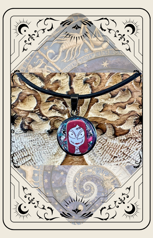 Necklace with cartoon character pendant on a textured background within a decorative border.