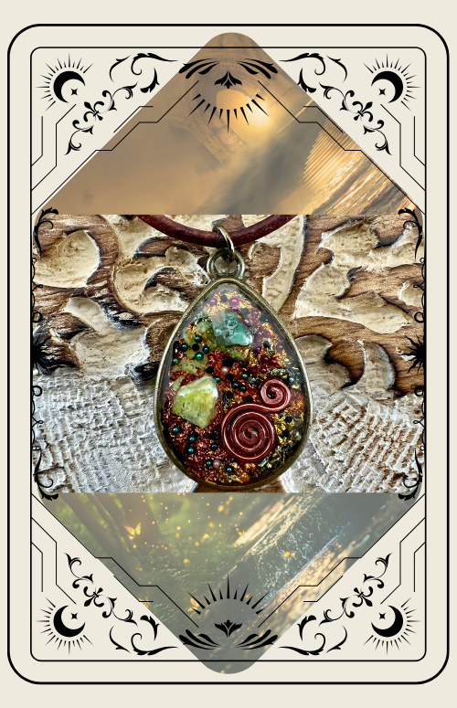 Orgone pendant necklace with resin and crystals, against a textured background, set in decorative frame.