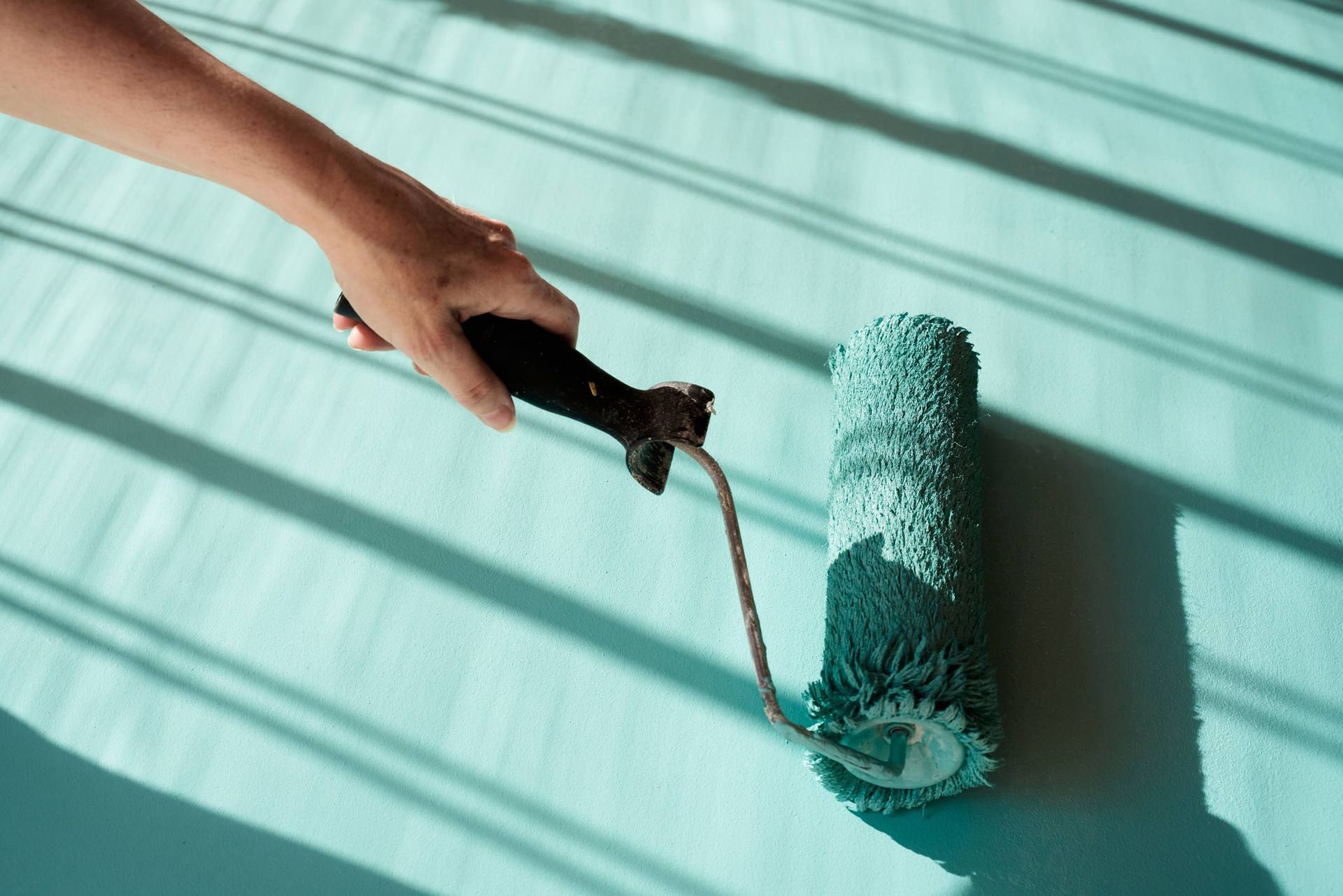Roller Painting A Wall — Mt. Holly, NJ — Gcapital Handyman Services LLC Roller Painting A Wall — Mt. Holly, NJ — Gcapital Handyman Services LLC