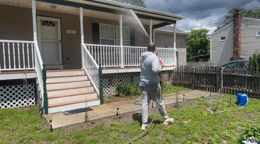 Pressure Washer Cleaning A Weathered Deck — Mt. Holly, NJ — Gcapital Handyman Services LLC