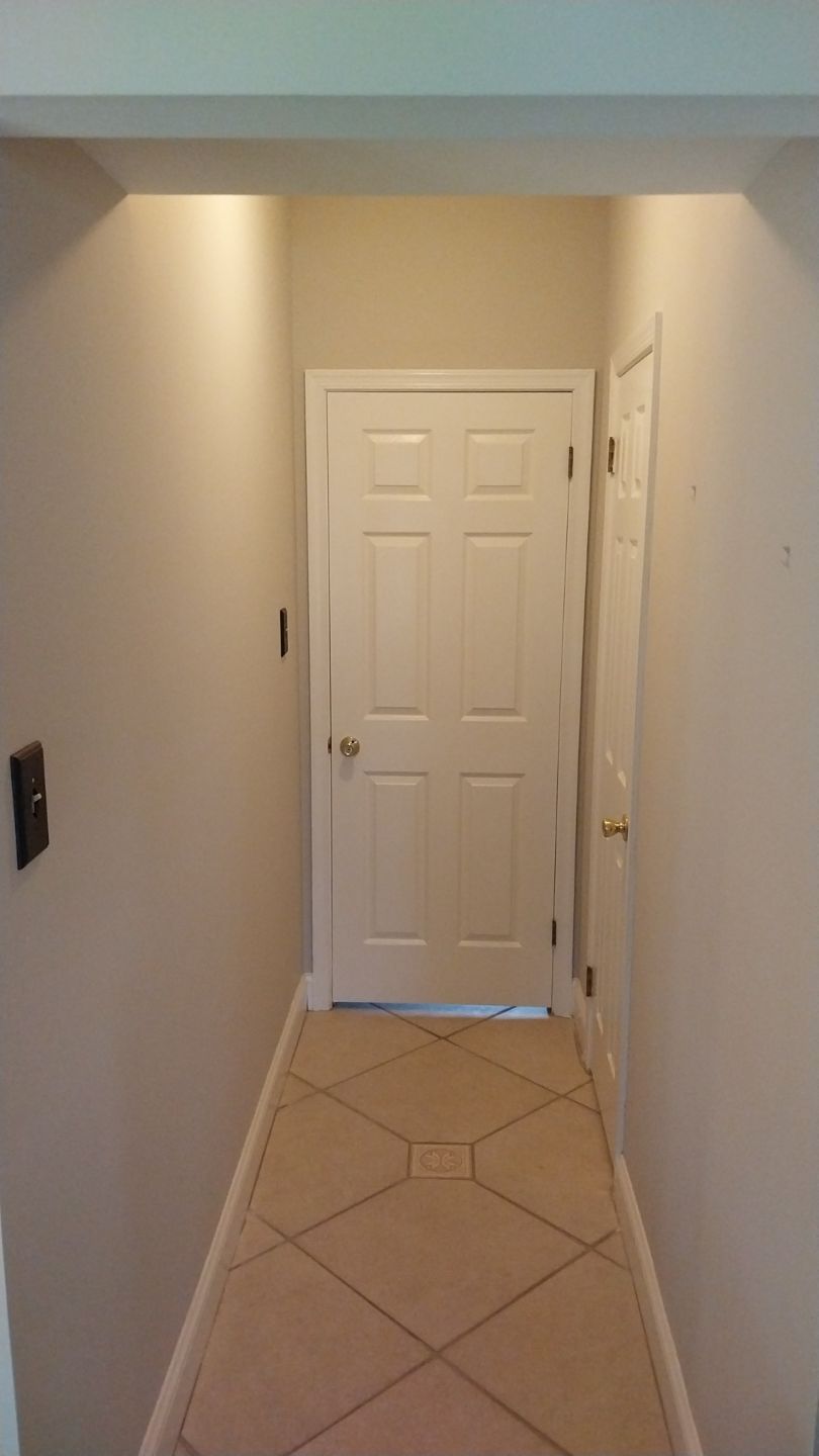 Living room hallway with freshly painted neutral walls – after interior painting in Hatfield, PA by Liberty & Freedom Painting.