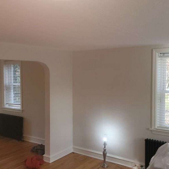 Interior Painting of white wall inside of house