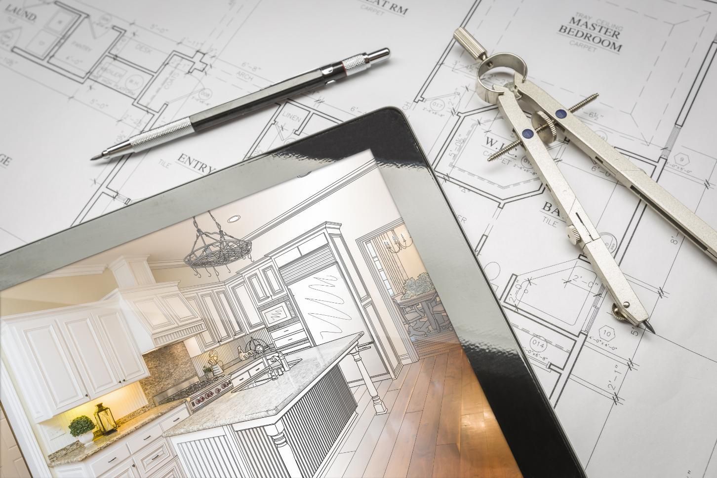 A digital tablet displaying a kitchen architectural sketch sits on house blueprints alongside a drafting pencil and compass.