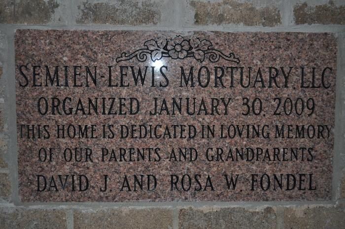 Plaque for Semien-Lewis Mortuary LLC, organized Jan. 30, 2009, with a dedication to parents and grandparents