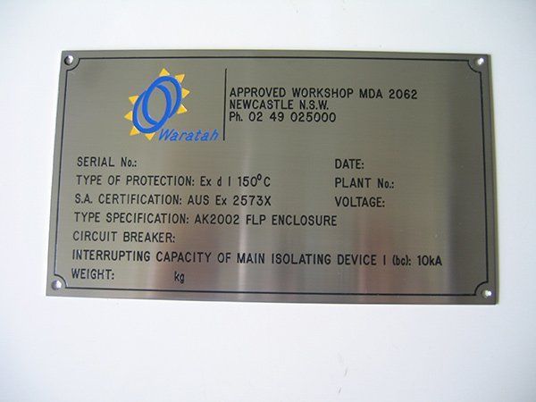 A stainless steel sign that says approved workshop on it