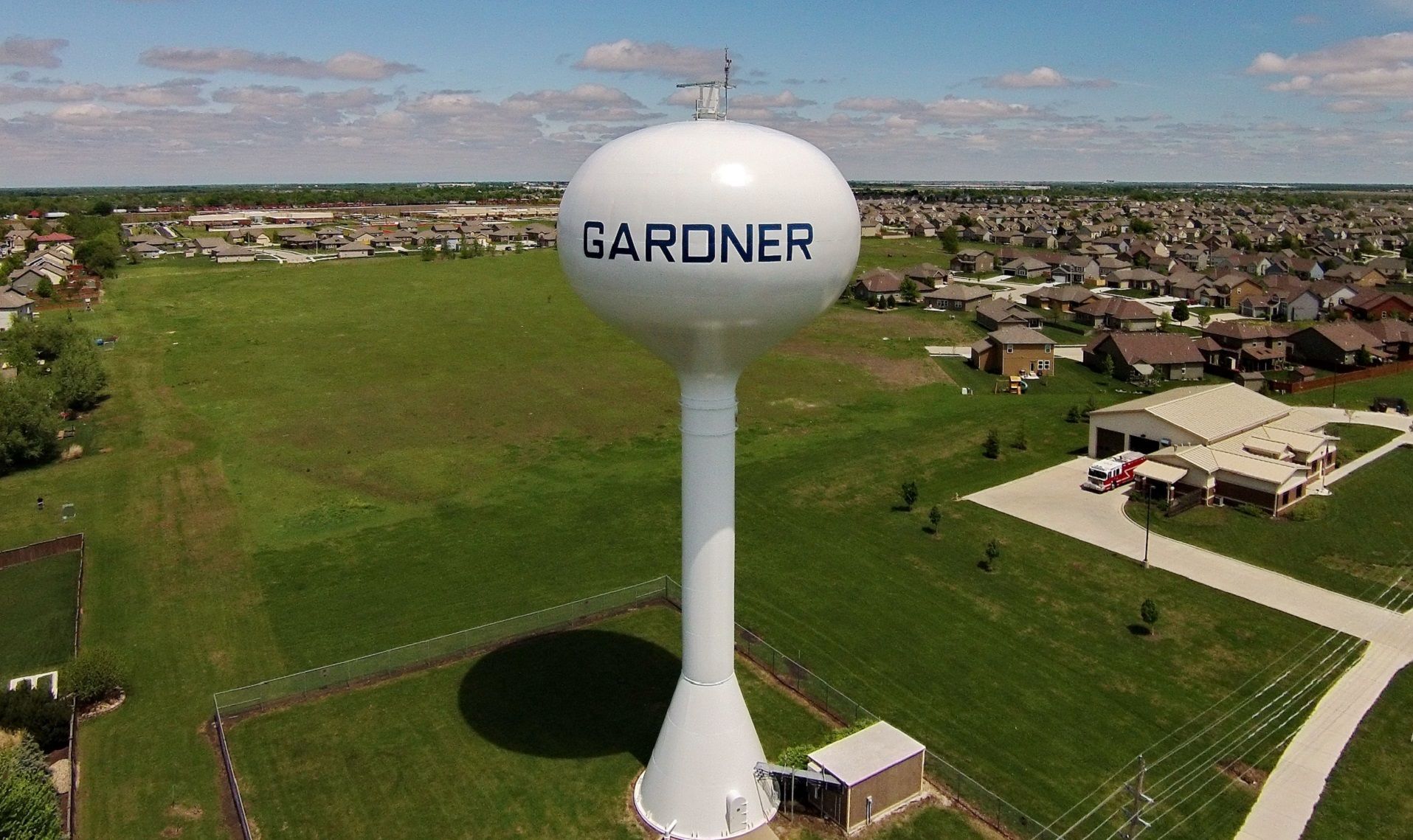 An aerial view of a water tower in the city of barone